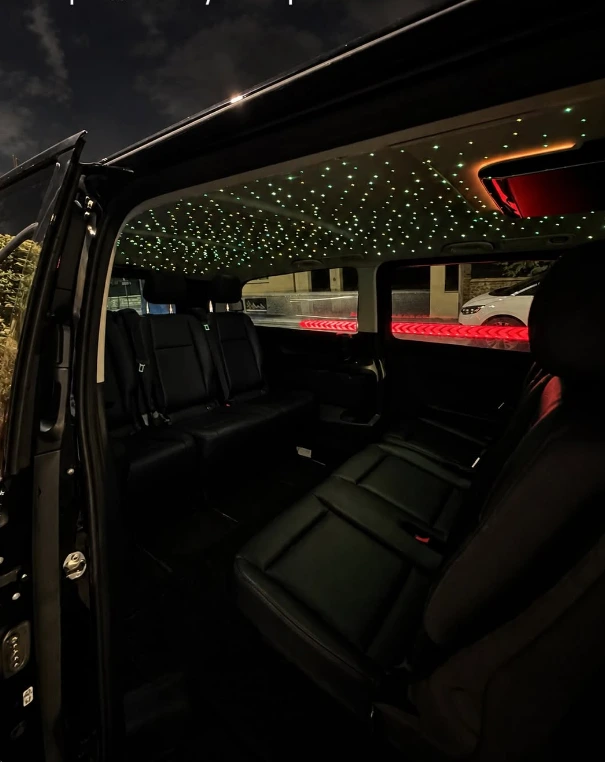 Van interior with illuminated starlight ceiling